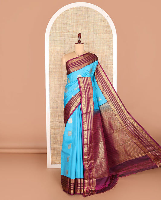 Blue zari buttas budget silk saree, contrast traditional zari design border, and pallu of jaal design