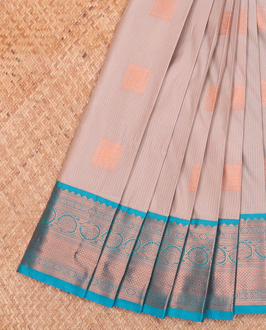 Grey Budget Silk Saree, Subtly Sparkled with Zari Buttas and Stripes on Its Body, Complemented by a Contrast Traditional Zari Design Border, Grand Jaal Pallu, and Paired with a Contrast Blouse