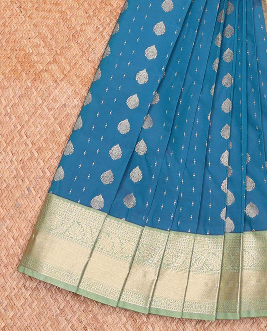 Blue Budget Silk Saree, Decked Up with Zari Buttas All Over Its Body, Complemented by a Contrast Traditional Zari Design Border, Intricately Designed Pallu, and Paired with a Contrast Blouse