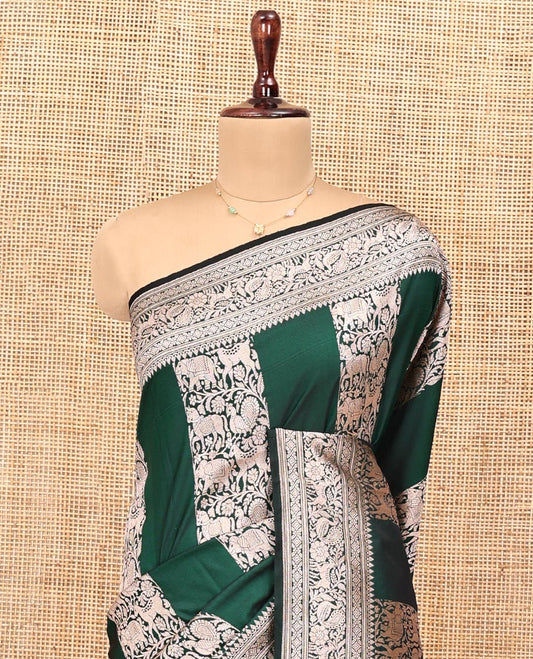 Green Banarasi Silk Saree, Opulently Embellished with Floral and Animal Motifs on Its Body, Highlighted by a Self-Border of Traditional Designs, Pallu of Stripes, and Paired with a Matching Blouse