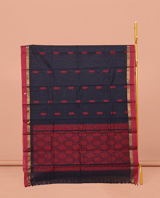 Black Kanchi Cotton Saree, Elevated with Buttas All Over Its Body, Complemented by Contrast Border, Floral Design Pallu and Paired with a Matching Blouse
