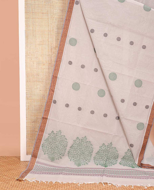 Half-white geometric motifs printed Coimbatore cotton saree, contrast geometric border, and leaf motif pallu