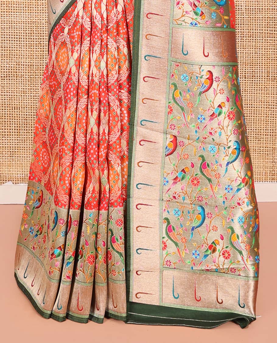 Orange Dola Silk Saree, Beautifully Bedecked with Bandhani Ghar Chola Patterns on Its Body, Complemented by Contrast Muniya Paithani Floral-Peacock Border, Pallu of Muniya Paithani Floral-Peacock Design, and Paired with a Contrast Blouse