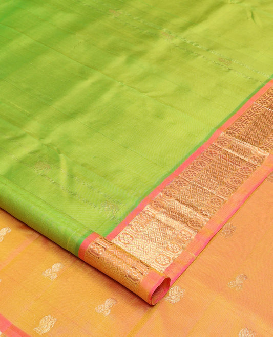 Green mayil buttas and zari stripes Kanchipuram silk saree, contrast one-sided border of laddu kamalam, and mayil kann designs, and zari design pallu