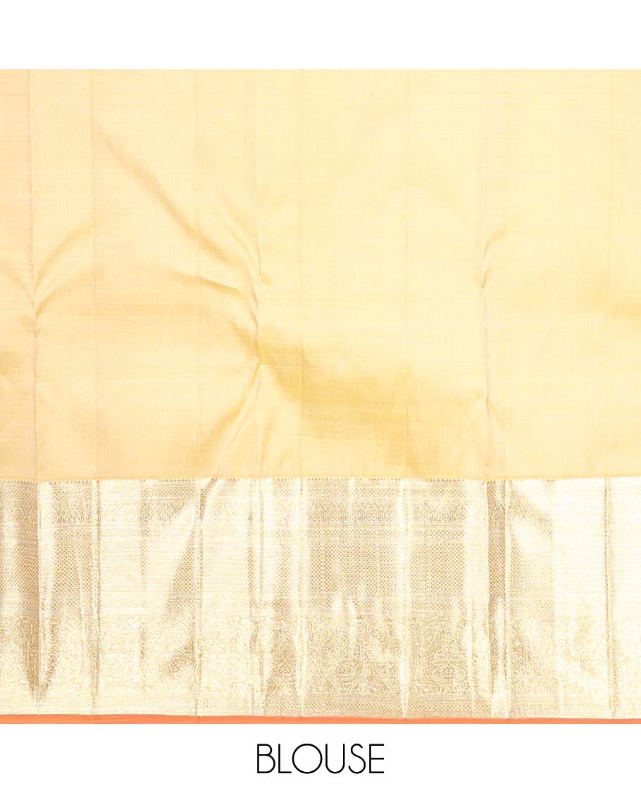 Yellow jacquard Kanchipuram silk saree, zari border of thilakam, kuyil kann, and arumbu manga designs, and geometric patterned pallu