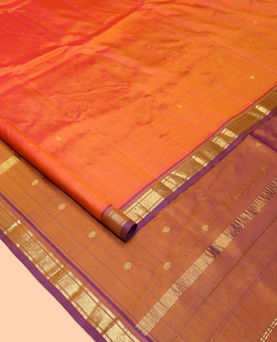Orange Kanchipuram Silk Saree, Crafted with Zari Buttas All Over Its Body, Complemented by a Contrast One-Sided Border of Banaras, and Mayil Kann Designs, Pallu of Zari Designs, and Comes Without a Blouse