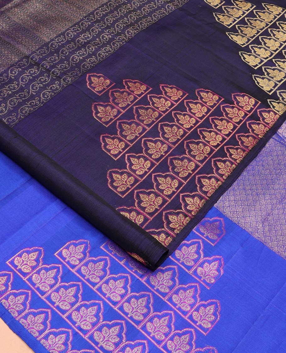 Borderless blue geometric, floral, and leaf butta enclosed Mughal arches woven Kanchipuram designer saree, contrast pallu of leaf butta enclosed Mughal arches and jaal designs