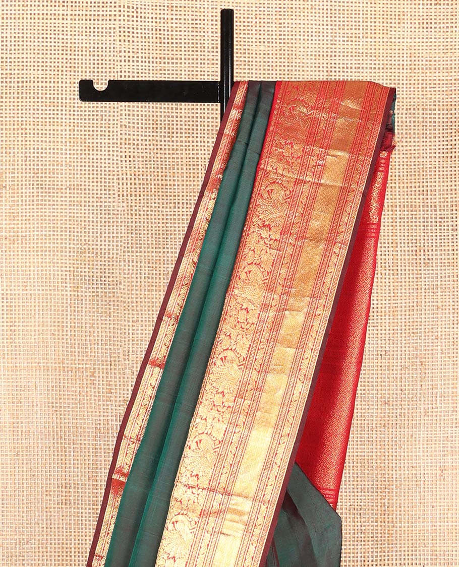 Green Plain Kanchipuram Soft Silk Saree, Complemented by a Contrast Korvai Border of Thilakam Mokku, Mayil, Muthu, Neli, and Mayil Kann Designs, Zari Elevated Jaal Pallu, and Paired with a Contrast Blouse