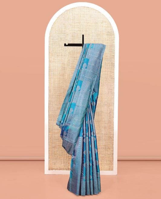 Blue Kanchipuram Designer Silk Saree, Subtly Enriched with Zari Designs Woven All Over Its Body, Highlighted by Zari Traditional Border, Zari Woven Pallu, and Paired with a Matching Blouse