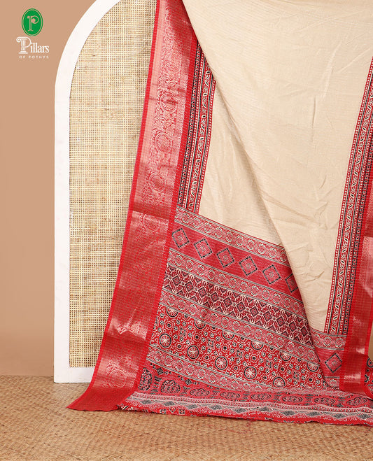 Cream vertical zari striped dola silksaree,contrast red traditional zari border & intricately Ajrakh-style printed pallu