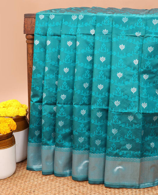 Peacock green  jaal design litchi soft silk saree with silver weaving border & silver zari rich pallu along with butta design blouse
