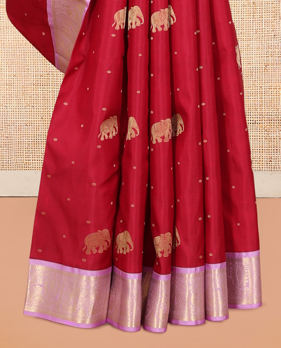 Pink Vasundhara Silk Saree Elevated with Yaanai and Mayil Buttas, Complemented by a Contrast Border of Muthu, Kathir, Mayil, and Yaanai Designs, Pallu Embellished with Diagonal Stripes, and Paired with a Contrast Blouse