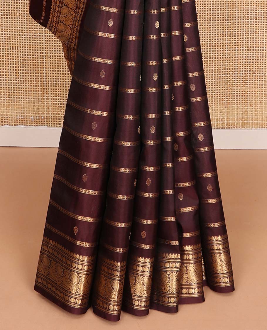 Brown zari design silk saree, zari border of thilakam mokku, banaras, poun, and mayil designs, and zari striped pallu