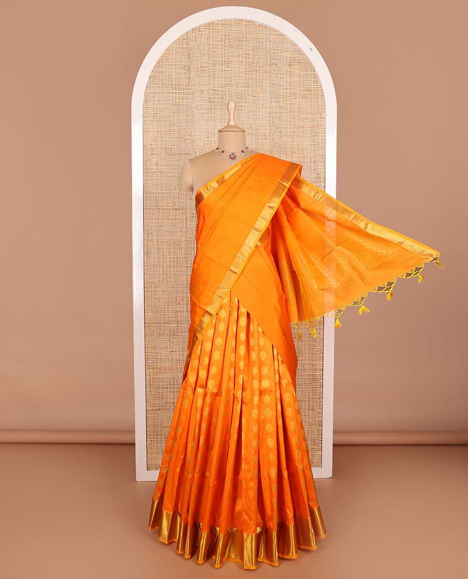 Orange pure silk half saree, zari buttas skirt, zari border of thilakam, and vanki designs, matching blouse, and paiyaadi kattam dhavani