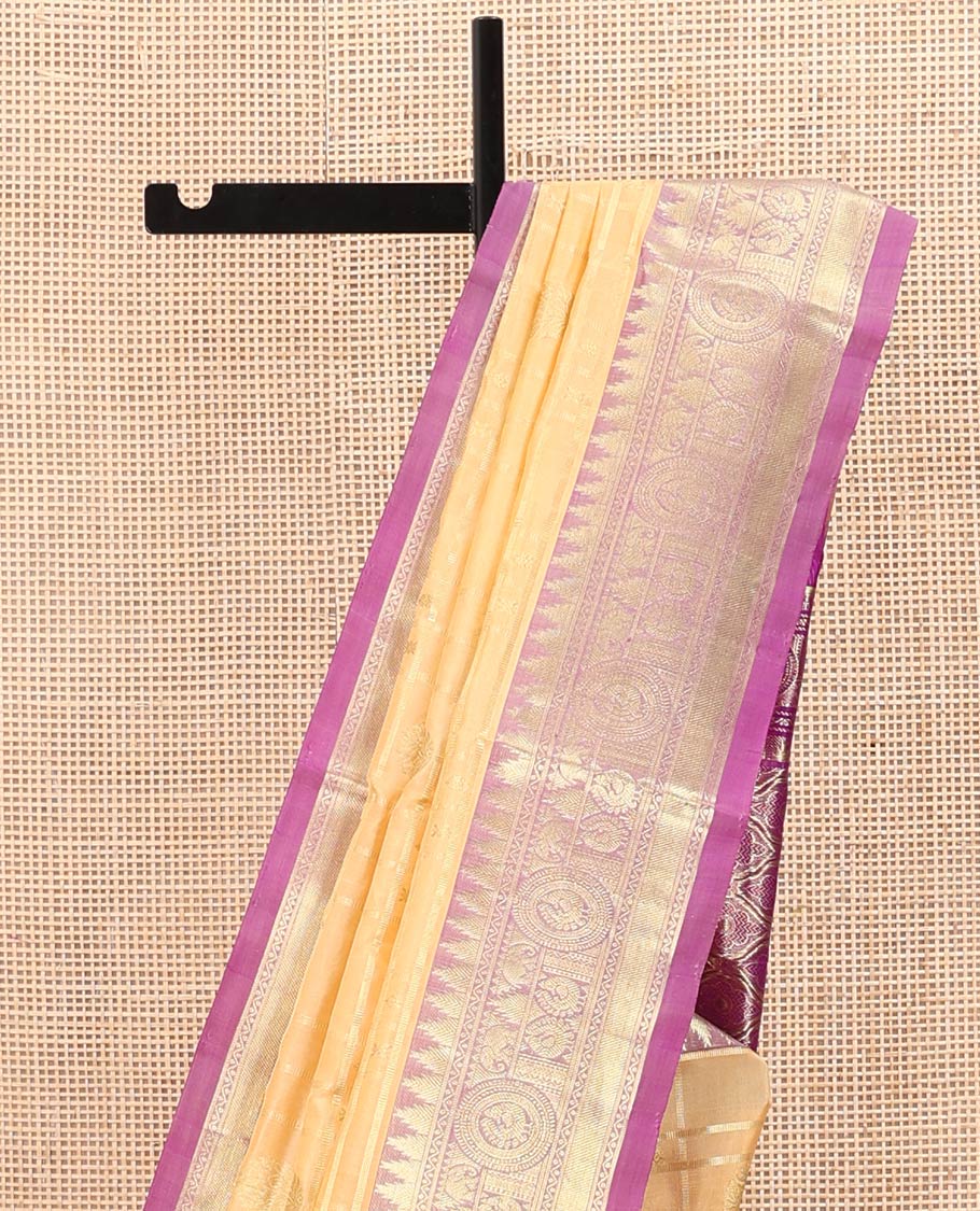 Sandal Venkatagiri Silk Saree, Masterfully Woven with Zari Buttas and Zari Stripes All Over Its Body, Complemented by a Contrast Temple Traditional Zari Border of Peacock and Elephant Designs, Grand Pallu of Jaal Designs, and Paired with a Contrast Blouse