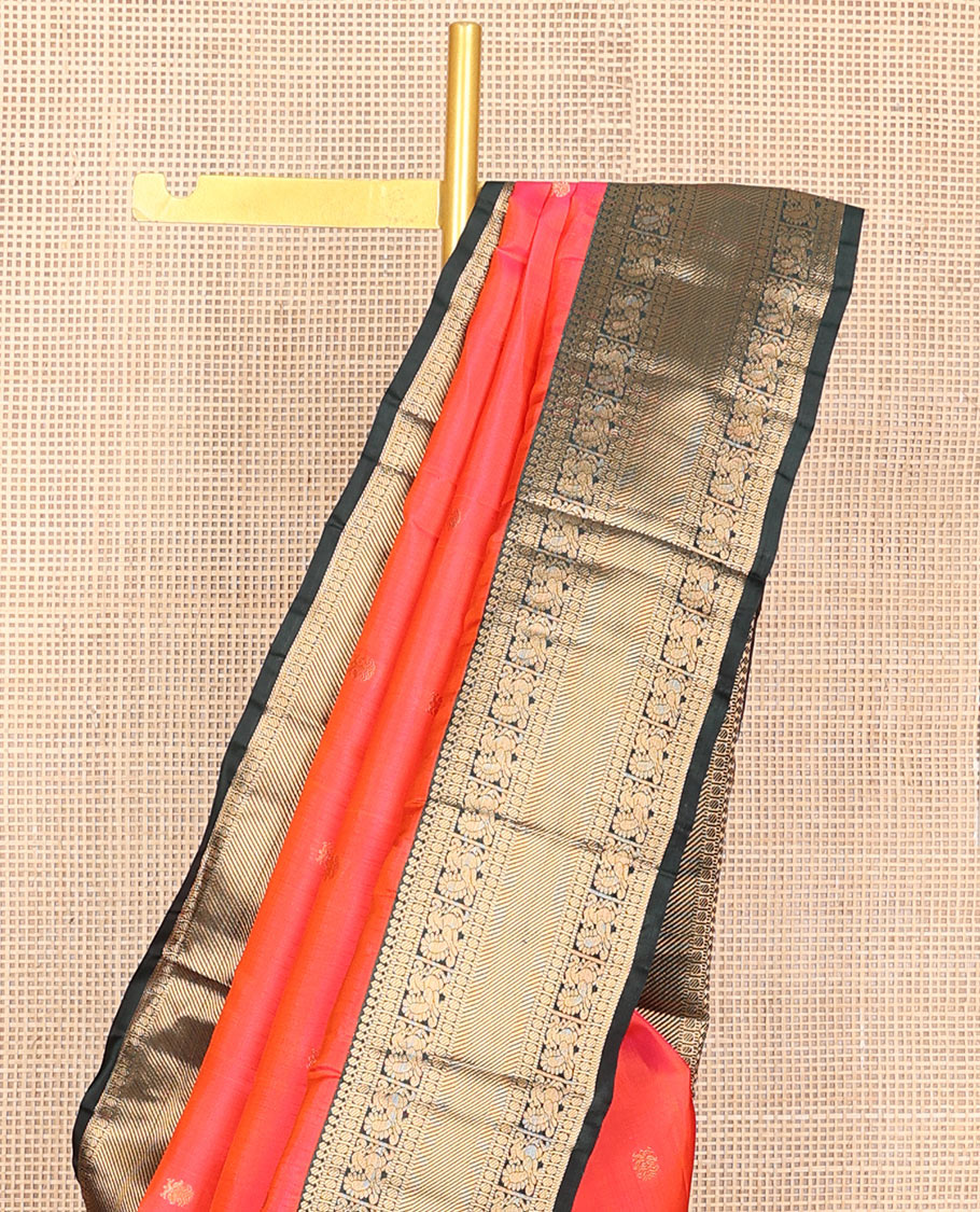 Orange iruthala pakshi Vasundhara silk mix saree, contrast border of thilakam,paisa,mayil & zari stripes & jaal pallu