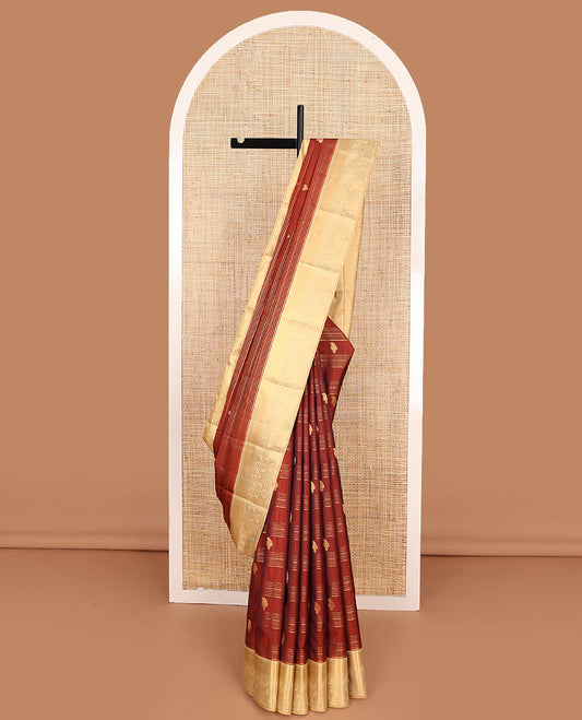 Orange Vasundhara Lite-Silk Mix Saree Decorated with Zari Stripes and Manga Buttas, Complemented by a Paithani-Themed Zari Woven Contrast Border, Pallu Elevated with Thilakam Motifs, and Comes with a Contrast Blouse