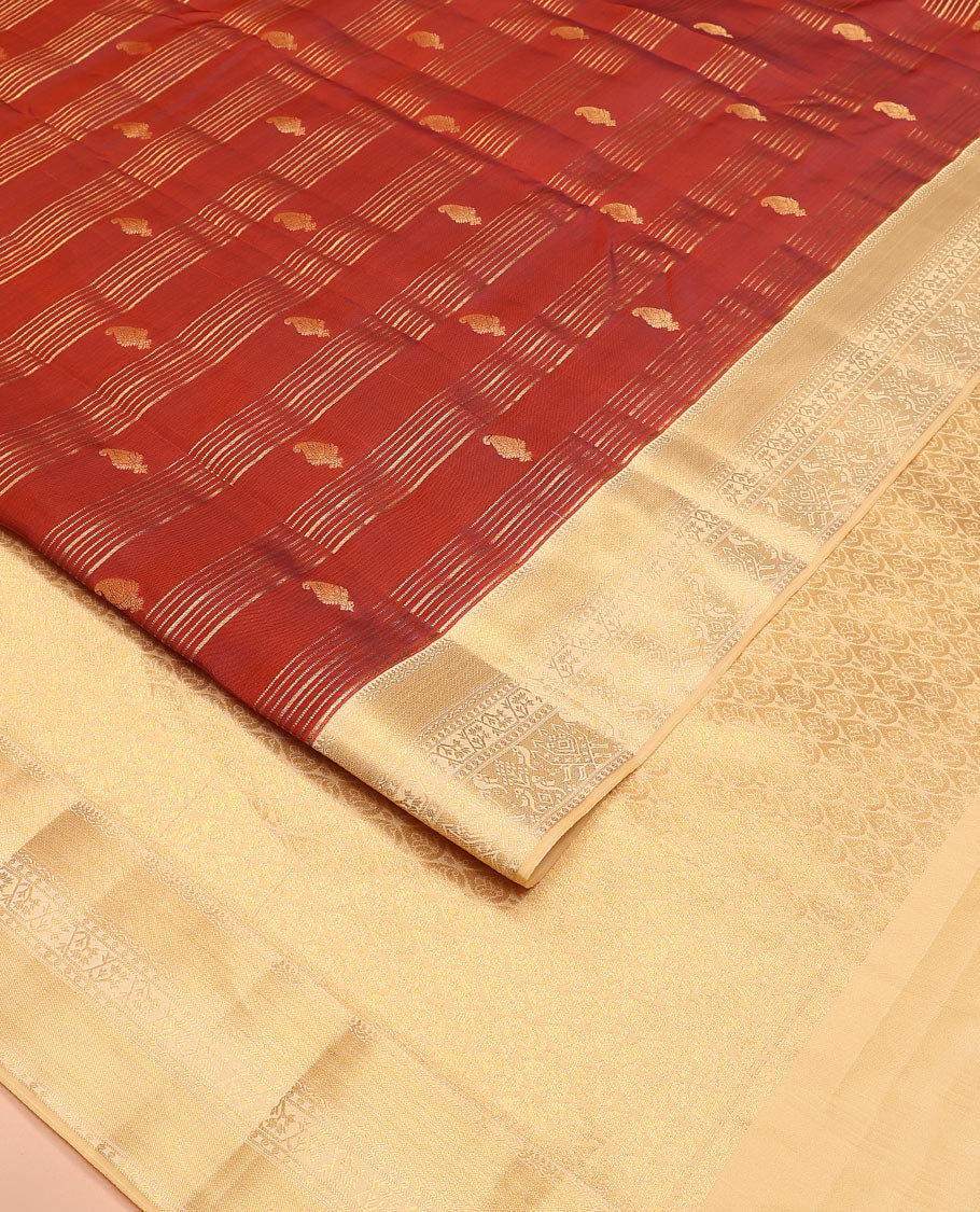 Orange Vasundhara Lite-Silk Mix Saree Decorated with Zari Stripes and Manga Buttas, Complemented by a Paithani-Themed Zari Woven Contrast Border, Pallu Elevated with Thilakam Motifs, and Comes with a Contrast Blouse