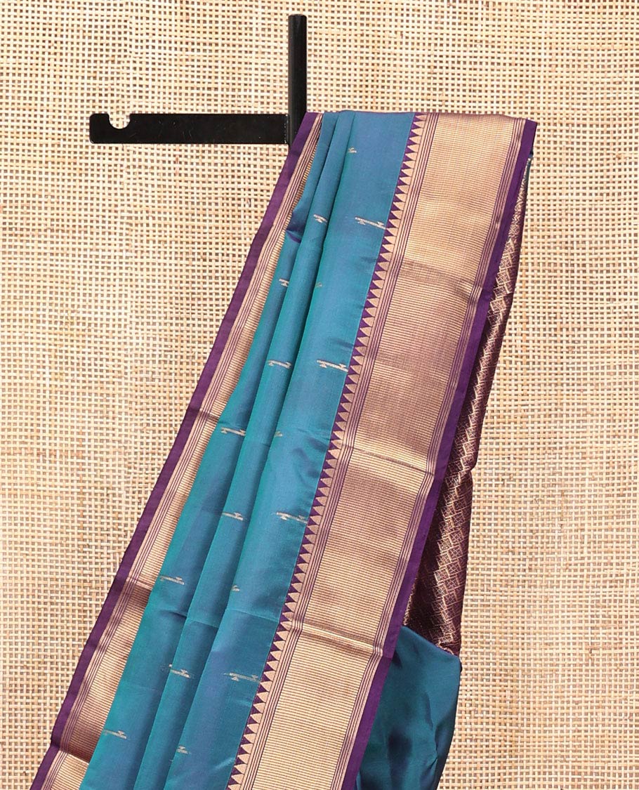 Blue Vasundhara Lite Silk Mix Saree, Sparsely Woven with Zari Buttas All Over Its Body, Complemented by a Contrast Temple Border, Grandly Decked Up Pallu, and Paired with a Contrast Blouse