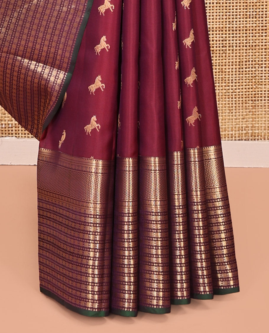 Maroon Vasundhara Lite Silk Mix Saree, Embellished with Zari Buttas All Over Its Body, Complemented by Contrast Border of Rekku, Kathir, Poun, Ara Maadam, and Geometric Patterns, Grand Pallu and Paired with a Contrast Blouse