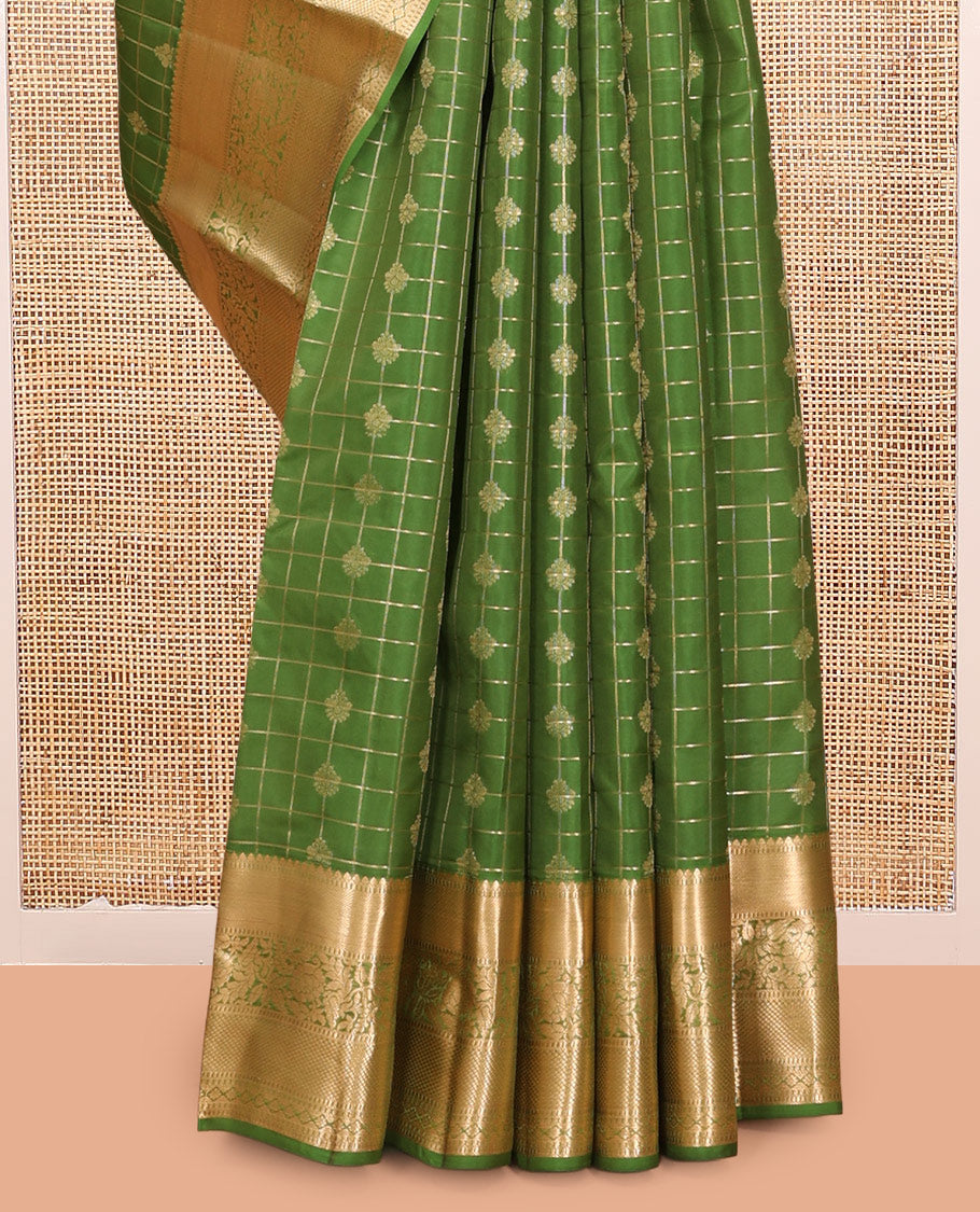 Green Vasundhara Lite Silk Mix Saree, Ornamented with Zari Buttas and Checks, a Zari Border of Thilakam, Kodi Visiry, and Kuyil Kann Designs, Grand Pallu, and a Matching Blouse