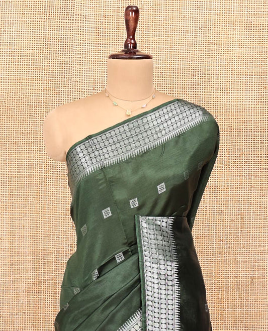 Green Banana Pith Saree, Mesmerized with Square Buttas All Over Its Body, Subtly Woven Temple Border of Rudraksham Designs, Pallu of Buttas, and Paired with a Matching Blouse