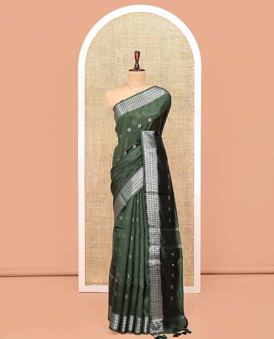 Green Banana Pith Saree, Mesmerized with Square Buttas All Over Its Body, Subtly Woven Temple Border of Rudraksham Designs, Pallu of Buttas, and Paired with a Matching Blouse