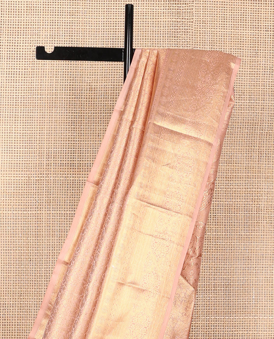 Dusky pink jacquard wedding silk saree, intricately zari-woven pallu & zari geometric patterned border