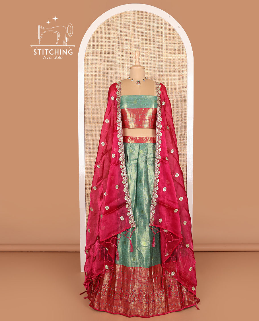 Green art silk half-saree, buttas with contrast traditional zari big bordered skirt, matching blouse, and contrast scallop embroidered dhavani