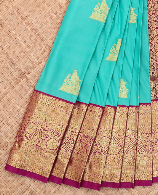 Blue Budget Silk Saree, Detailed with Buttas All Over Its Body, Complemented by a Contrast Traditional Zari Design Border, Intricately Designed Pallu, and Paired with a Contrast Blouse