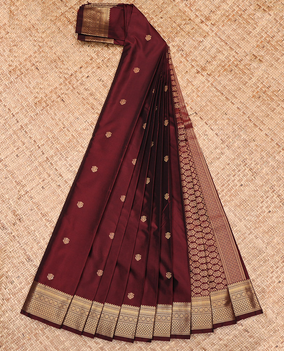 Maroon Budget Silk Saree, Delicately Woven with Zari Buttas, Highlighted by a Traditional Zari Border, Intricate Pallu, and a Matching Blouse