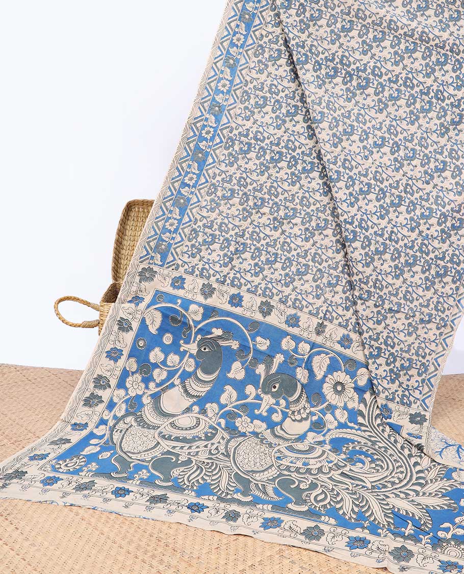 Blue floral machine-printed kalamkari cotton saree, floral border & peacock pallu