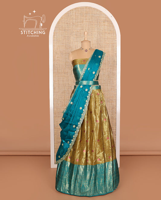 Green art silk half-saree, thread buttas woven with contrast traditional zari bordered skirt, matching blouse, and contrast scallop embroidered dhavani
