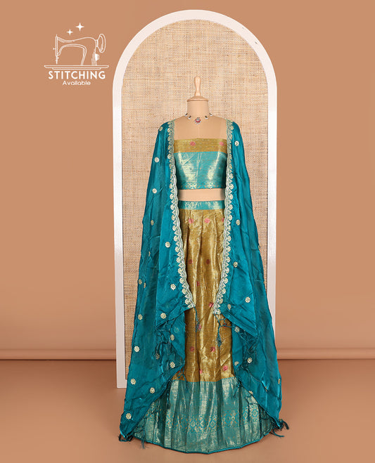 Green art silk half-saree, thread buttas woven with contrast traditional zari bordered skirt, matching blouse, and contrast scallop embroidered dhavani