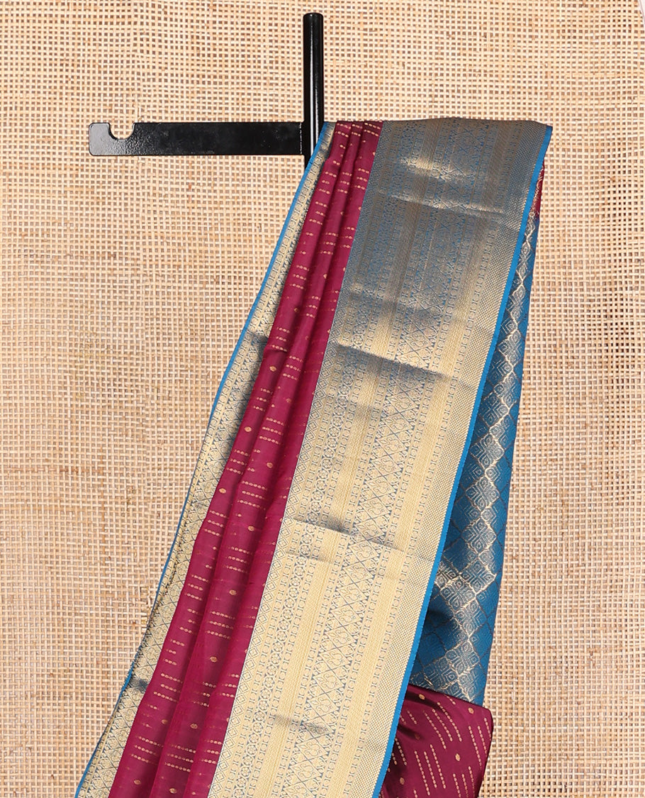 Maroon zari buttas Vasundhara silk mix, contrast border of diamond, kodi visiry, rudraksham, vanki, manga designs, and jaal pallu