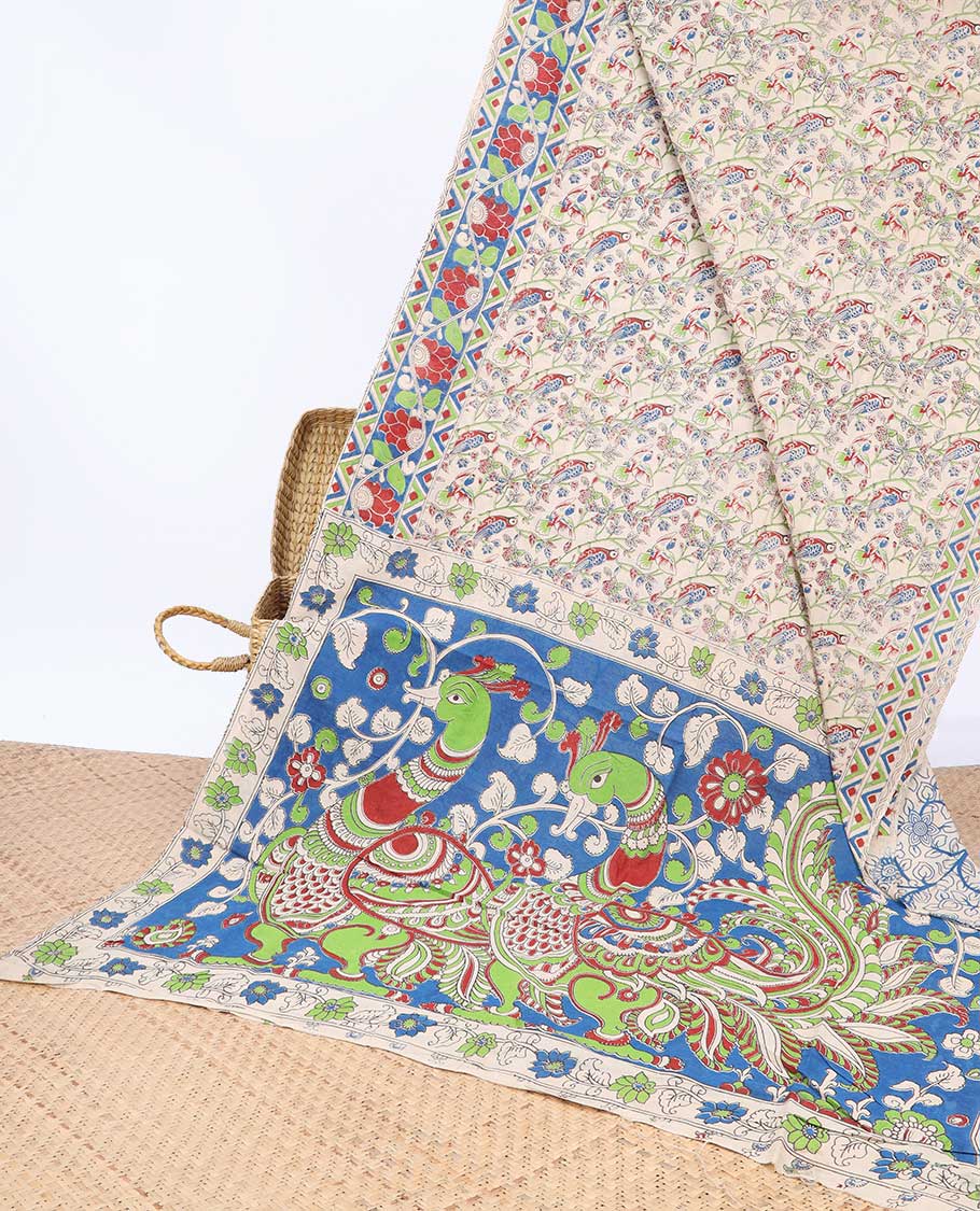 Cream floral machine-printed kalamkari cotton saree, contrast floral & chevron border & peacock pallu