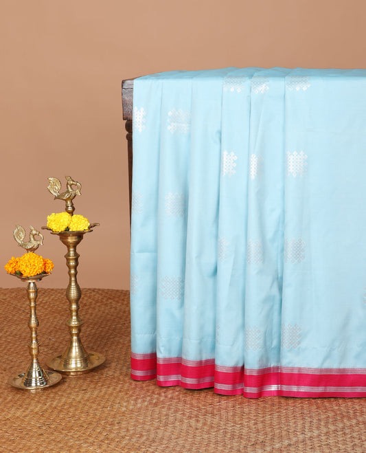 Blue kolam design semi soft silk with zari double pet border & peacock design, rich pallu along with plain blouse