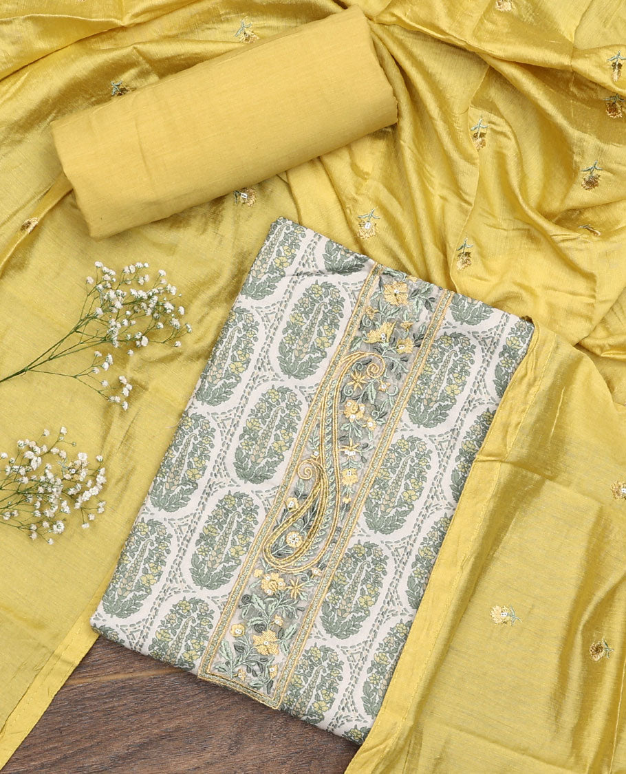 Yellow material chudidar set, intricately printed with neck work top, plain bottom, and floral motifs embroidered dupatta