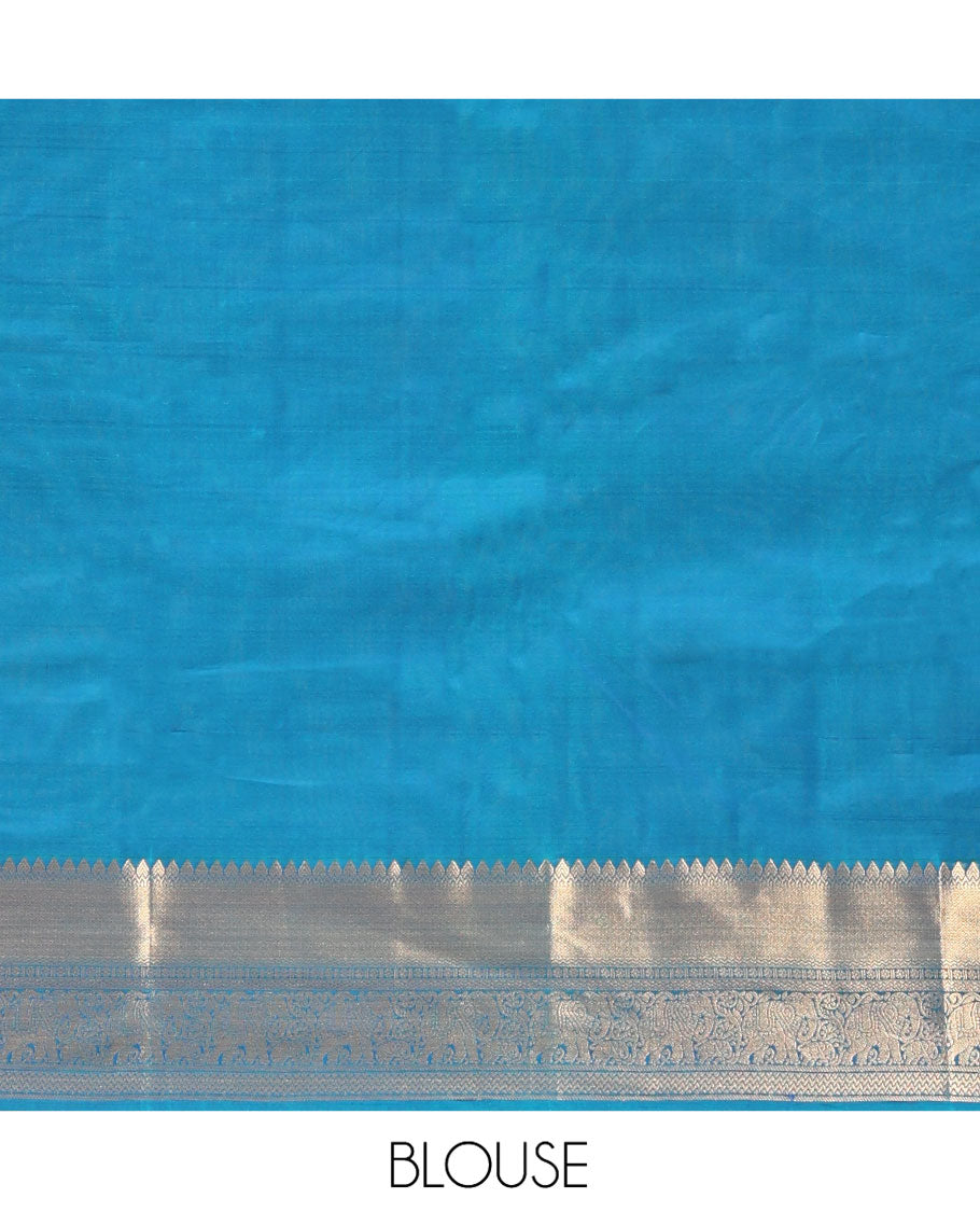 Blue Vasundhara Lite Silk Saree, Accentuated with Zari Buttas All Over Its Body, Highlighted by Zari Border of Thilakam, Mayil Kann, Kamalam, Rettai Neli, Yannai, and Vanki Designs, Delicately Woven Pallu and Paired with a Matching Blouse