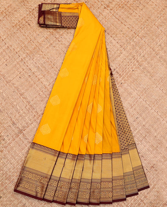 Yellow Budget Silk Saree, Subtly Sparkled Zari with Buttas All Over Its Body, Complemented by a Contrast Traditional Zari Border, Intricately Designed Pallu, and Paired with a Contrast Blouse