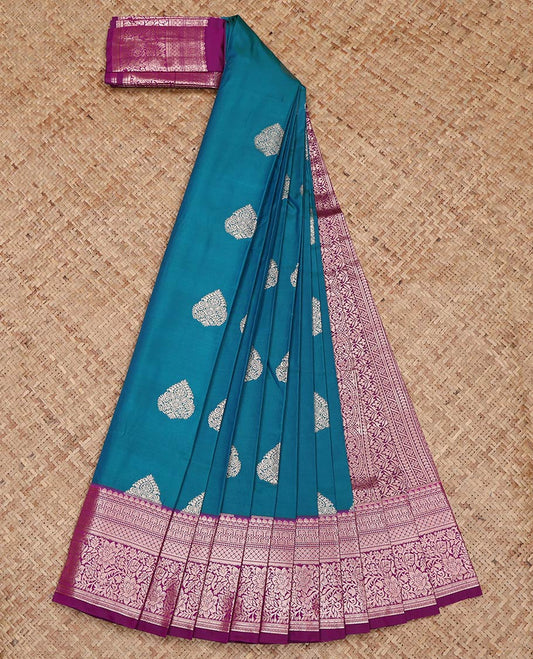 Peacock Blue Budget Silk Saree, Enriched with Zari Buttas on Its Body, Complemented by a Contrast Traditional Zari Design Border, Intricately Designed Pallu, and Paired with a Contrast Blouse