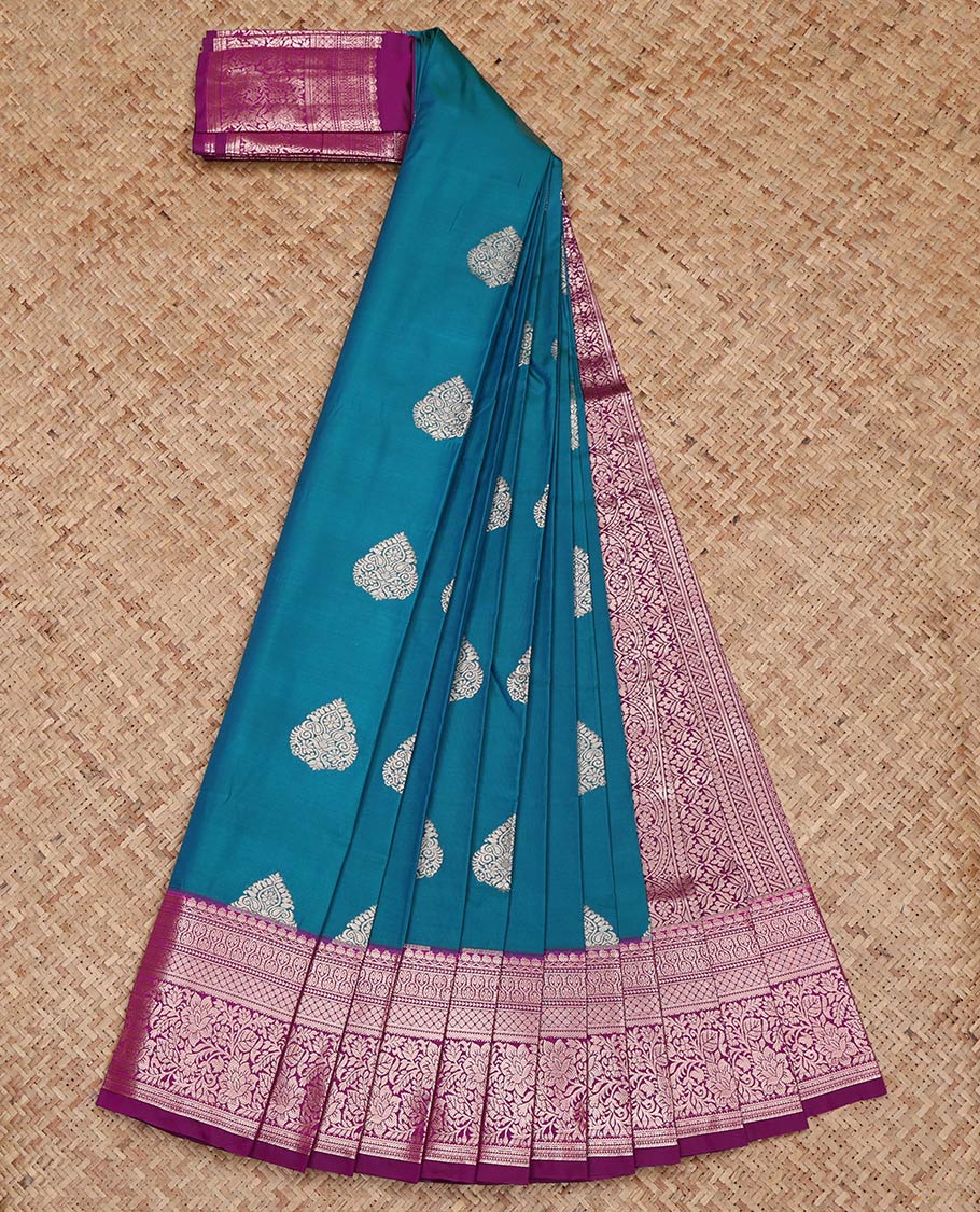 Peacock Blue Budget Silk Saree, Enriched with Zari Buttas on Its Body, Complemented by a Contrast Traditional Zari Design Border, Intricately Designed Pallu, and Paired with a Contrast Blouse
