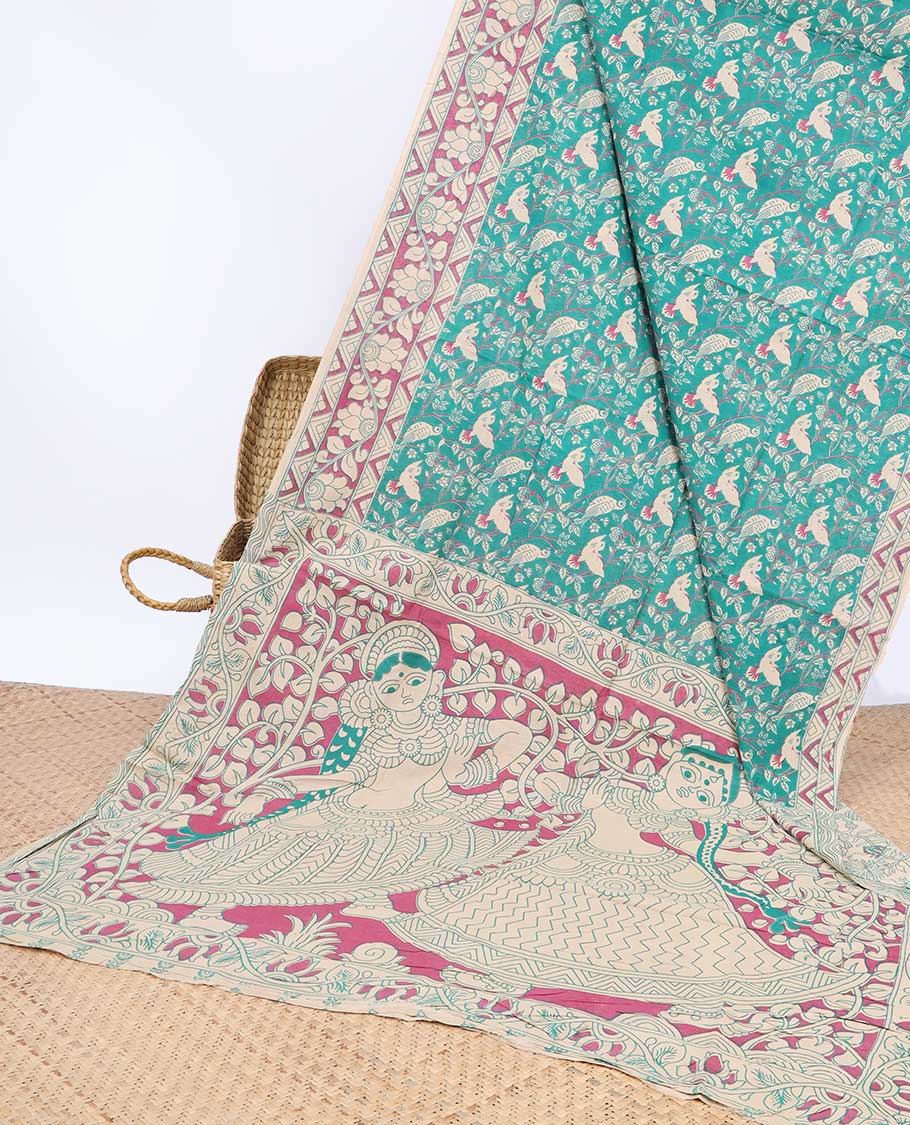 Blue floral & bird machine-printed kalamkari cotton saree, contrast floral border & human figurines pallu