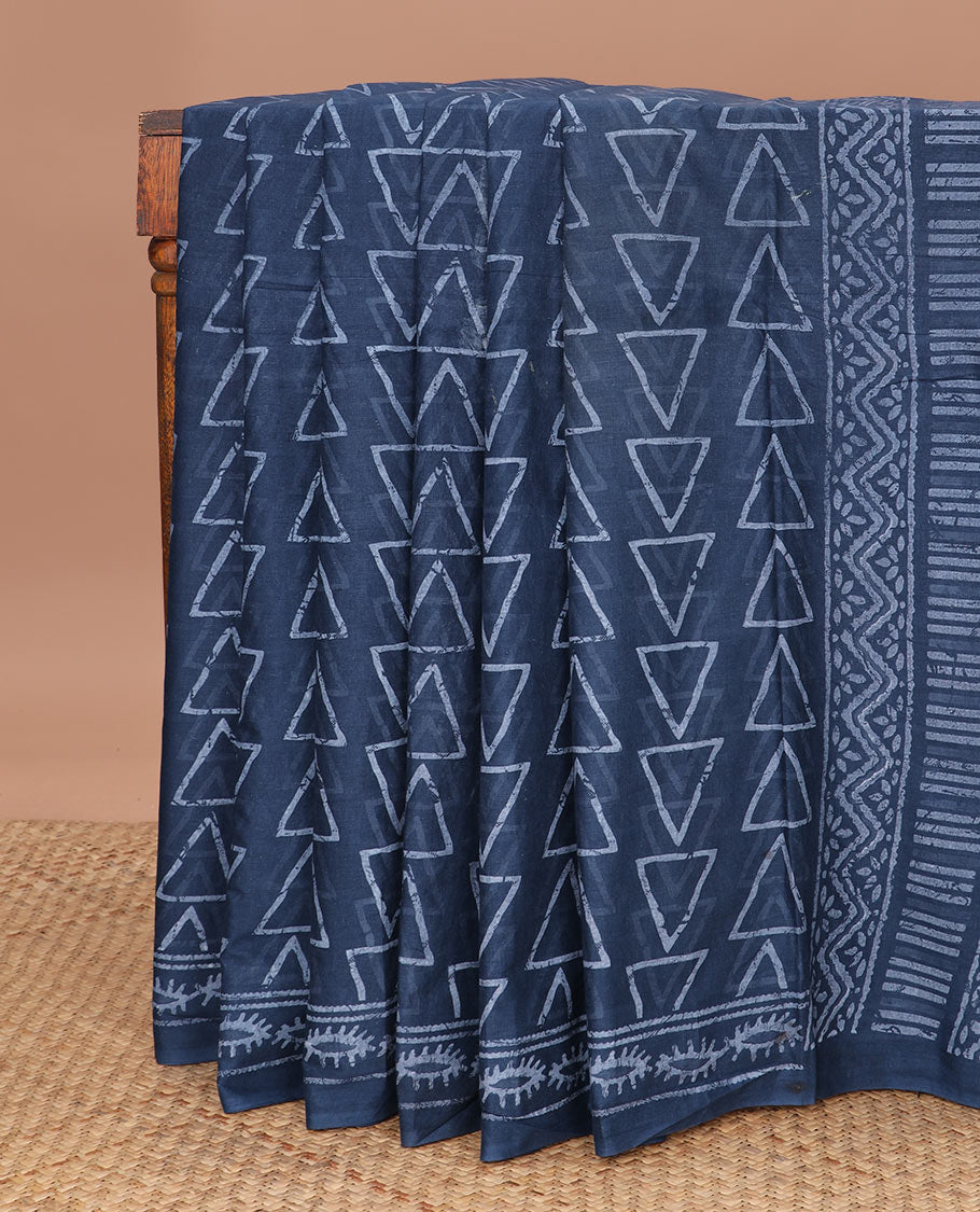 Blue batik-style triangle motifs mul mul cotton saree, batik-style printed border & floral-geometric printed pallu