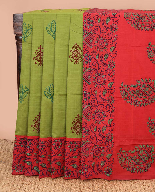 Parrot green unique motifs printed poly cotton saree, contrast floral motifs border, and paisley motif pallu