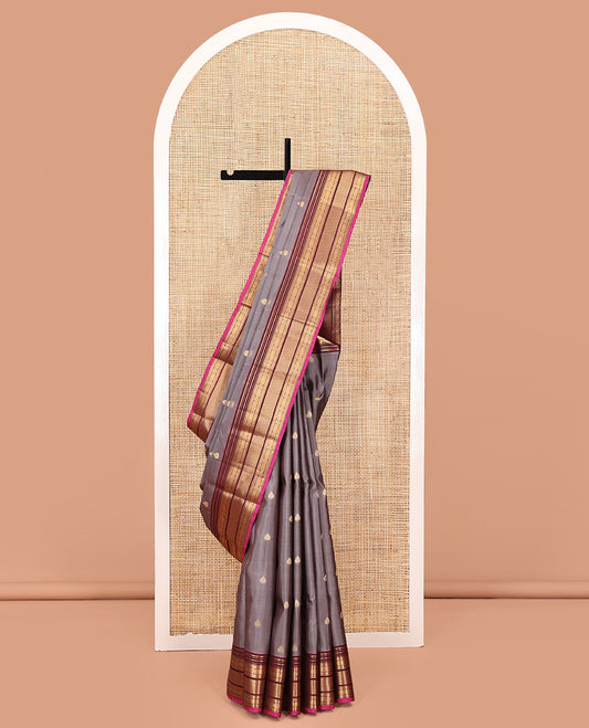 Grey Vasundhara Lite Silk Saree, Bedecked with Zari Buttas All Over Its Body, Complemented by Contrast Border of Rekku, Banaras, and Meen Designs, Grand Pallu and Paired with a Contrast Blouse
