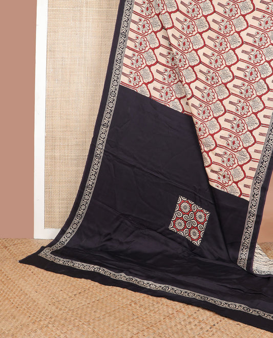 Off-white floral jaal design modal silk saree with contrast floral design & floral design pallu