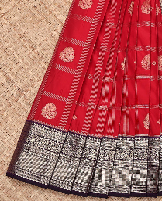 Red Budget Silk Saree, Accentuated with Zari Butta Enclosed Checked Design on Its Body, Complemented by a Contrast Traditional Zari Design Border, Grand Jaal-Patterned Pallu, and Paired with a Contrast Blouse