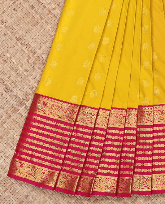 Yellow Budget Silk Saree, Sparsely Sparkled with Zari Buttas All Over Its Body, Complemented by Contrast Traditional Zari Border of Peacock and Rudrksham Designs, Grand Jaal-Patterned Pallu, and Paired with a Contrast Blouse