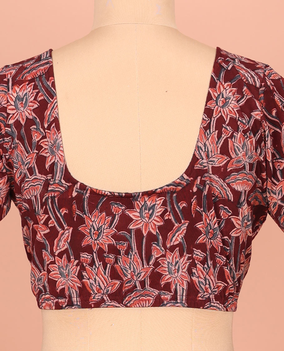 Maroon Cotton Readymade Blouse Bedecked with All-Over Floral Motifs Print, Featuring a Front Round-Neck, a Back Round-Neck, and Elbow Sleeves